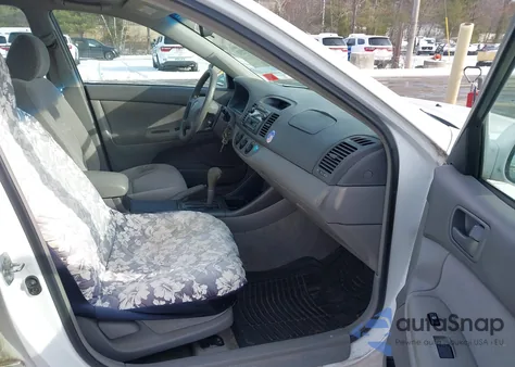 2003 Toyota Camry Le z USA, uszkodzony, nr VIN 4T1BE32K73U229830